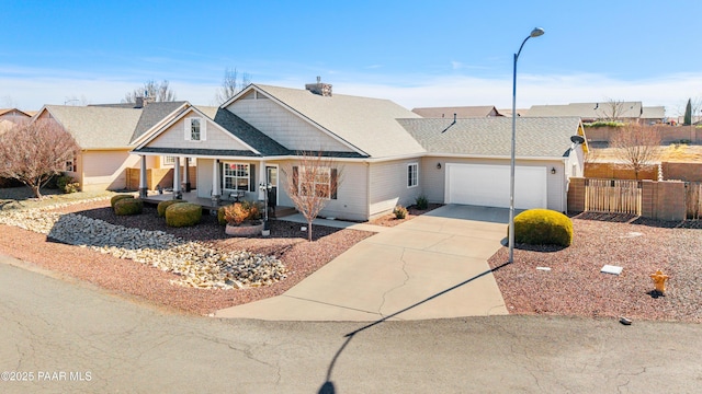 view of front of home with a garage and covered porch