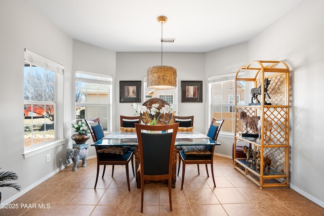 view of tiled dining space