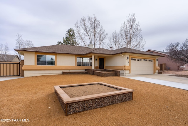 single story home with roof with shingles, driveway, an attached garage, a chimney, and stucco siding