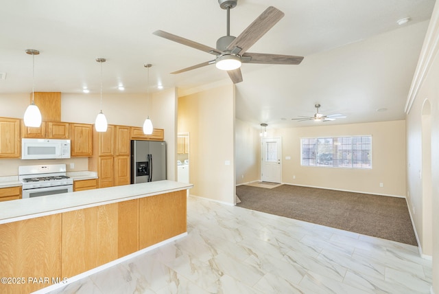 kitchen featuring baseboards, decorative light fixtures, light countertops, marble finish floor, and white appliances