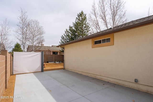 view of patio / terrace with fence