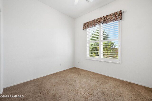 7876 N Siesta Sunset Ln, Prescott Valley, AZ 86315 - carpeted spare room featuring baseboards and ceiling fan