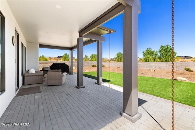 view of patio with a fenced backyard