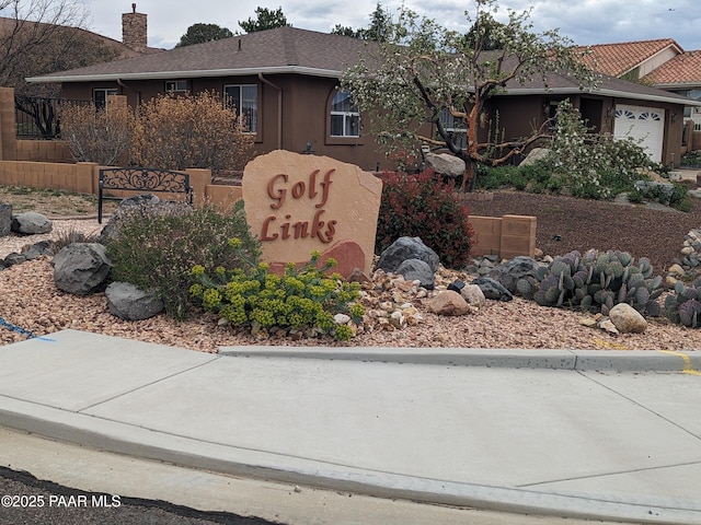 community sign with a garage