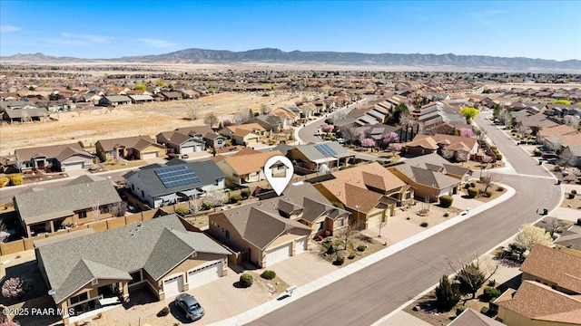aerial view featuring a mountain view and a residential view