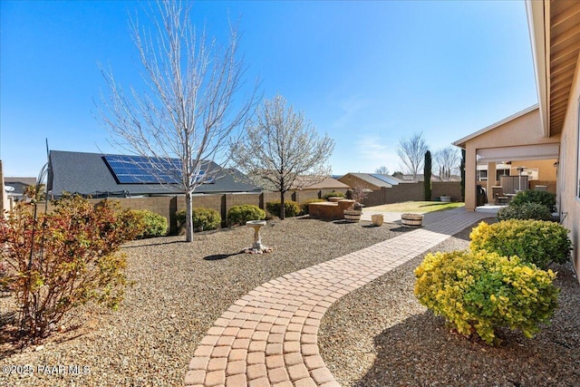 view of yard with a patio and a fenced backyard