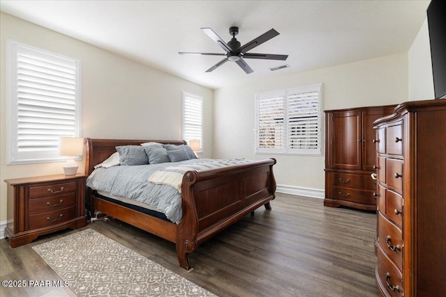 6969 E Encampment Dr, Prescott Valley, AZ 86314 - bedroom with dark wood-type flooring and ceiling fan
