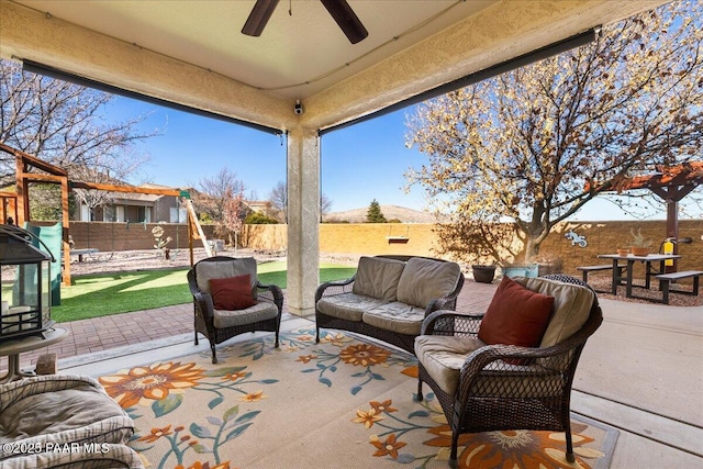 6969 E Encampment Dr, Prescott Valley, AZ 86314 - view of patio / terrace with an outdoor living space and ceiling fan