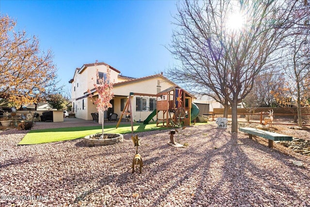 6969 E Encampment Dr, Prescott Valley, AZ 86314 - exterior space featuring a playground and an outdoor fire pit