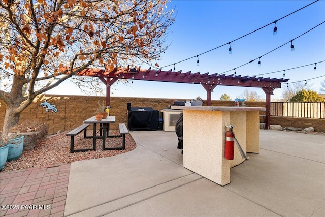 6969 E Encampment Dr, Prescott Valley, AZ 86314 - view of patio with exterior bar and exterior kitchen