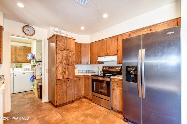 kitchen with separate washer and dryer and stainless steel appliances