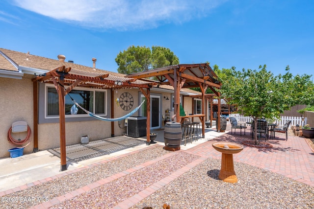 11755 Hondo Hts, Dewey-Humboldt, AZ 86327 - view of patio featuring a pergola, central air condition unit, and outdoor dining space
