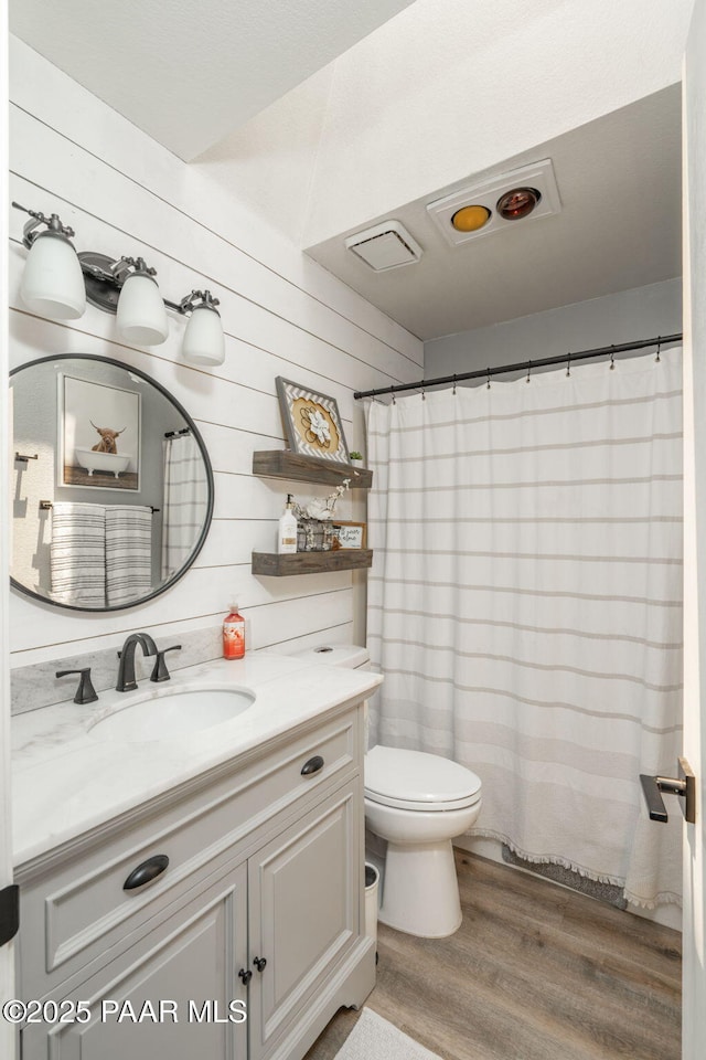 11755 Hondo Hts, Dewey-Humboldt, AZ 86327 - bathroom with wood finished floors, vanity, and toilet