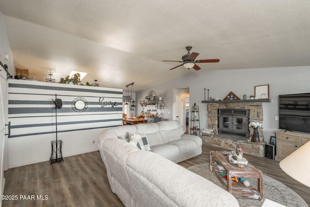 11755 Hondo Hts, Dewey-Humboldt, AZ 86327 - living area with ceiling fan, wood finished floors, vaulted ceiling, and a textured ceiling