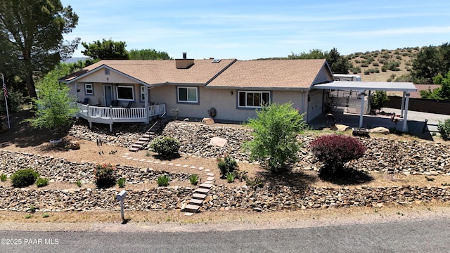 11755 Hondo Hts, Dewey-Humboldt, AZ 86327 - ranch-style home with stairs, stucco siding, a carport, and a wooden deck