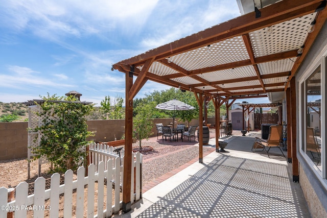 11755 Hondo Hts, Dewey-Humboldt, AZ 86327 - fenced backyard featuring a patio and outdoor dining space