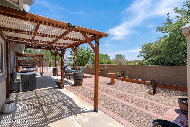 11755 Hondo Hts, Dewey-Humboldt, AZ 86327 - fenced backyard with a pergola, central AC unit, and a patio