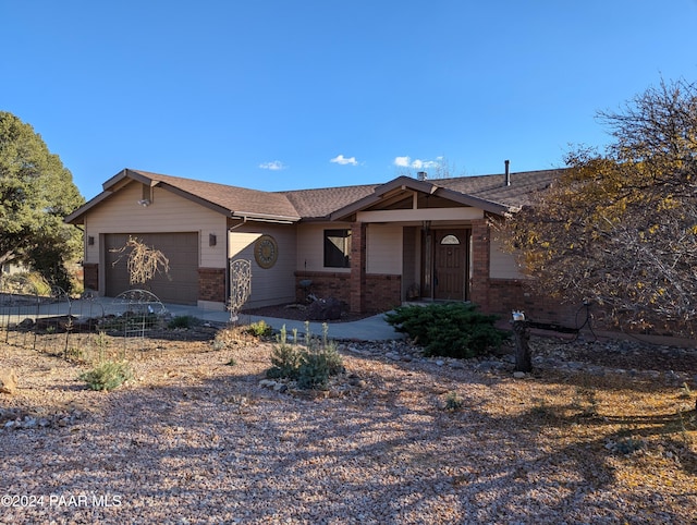 ranch-style home with a garage