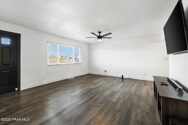 25355 N Catalina St, Paulden, AZ 86334 - unfurnished living room featuring a ceiling fan, baseboards, and dark wood finished floors