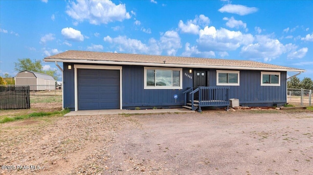25355 N Catalina St, Paulden, AZ 86334 - single story home with fence, dirt driveway, and a garage