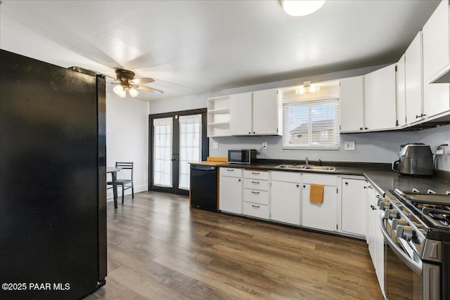 25355 N Catalina St, Paulden, AZ 86334 - kitchen with dark countertops, open shelves, dishwasher, a sink, and freestanding refrigerator