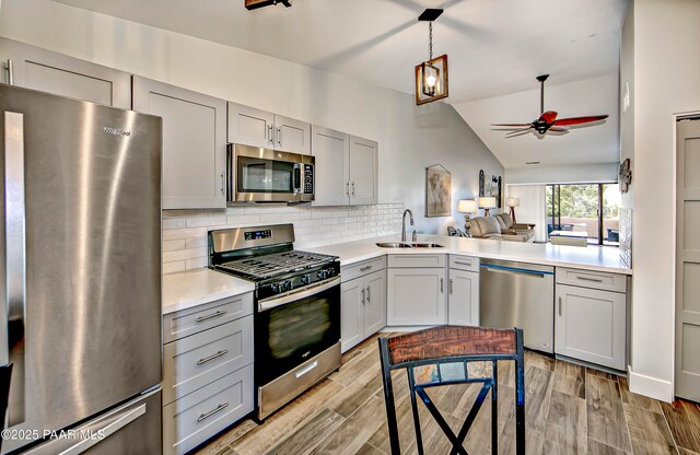 2151 S Resort Way Unit 1C, Prescott, AZ 86301 - kitchen with gray cabinetry, ceiling fan, a sink, and appliances with stainless steel finishes