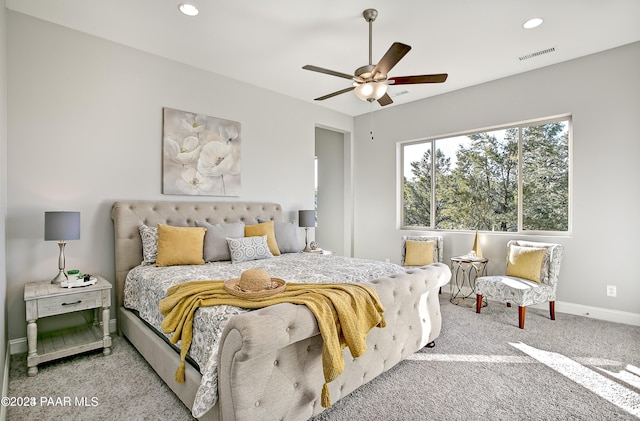 carpeted bedroom with baseboards, ceiling fan, recessed lighting, and visible vents