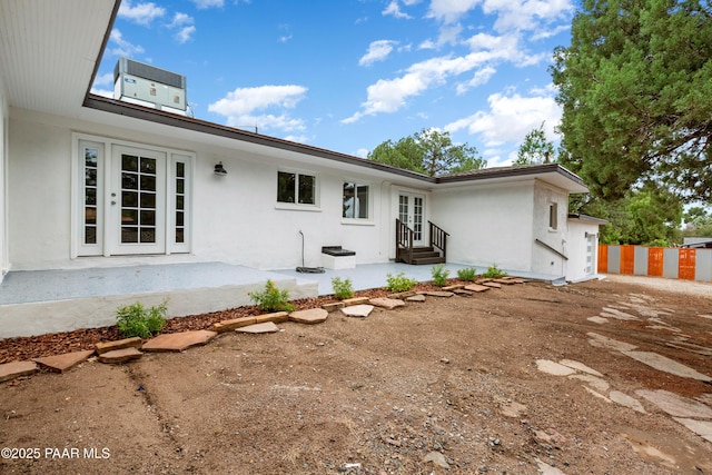 315 N Robinson Dr, Prescott, AZ 86303 - rear view of house featuring entry steps, stucco siding, french doors, and cooling unit
