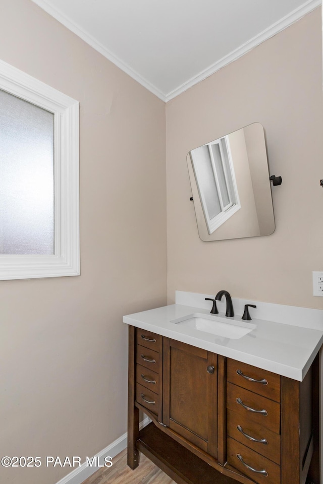 315 N Robinson Dr, Prescott, AZ 86303 - bathroom featuring vanity, ornamental molding, baseboards, and wood finished floors