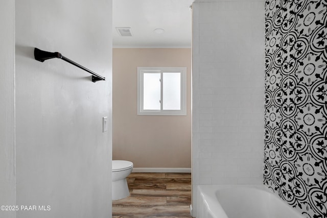 315 N Robinson Dr, Prescott, AZ 86303 - full bath featuring crown molding, wood finished floors, toilet, baseboards, and bathtub / shower combination
