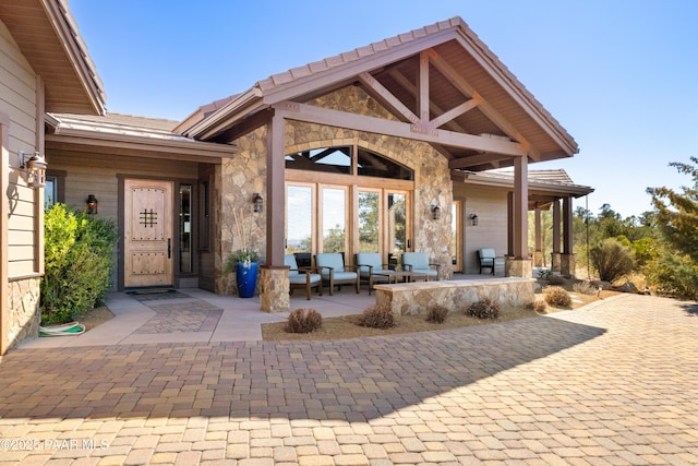 exterior space with stone siding