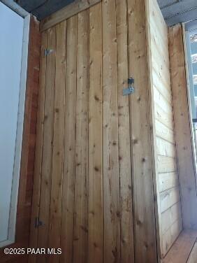 interior space with wooden walls