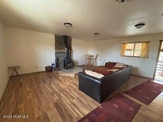 16432 Incline Trl, Williams, AZ 86046 - living area with a wood stove and wood finished floors