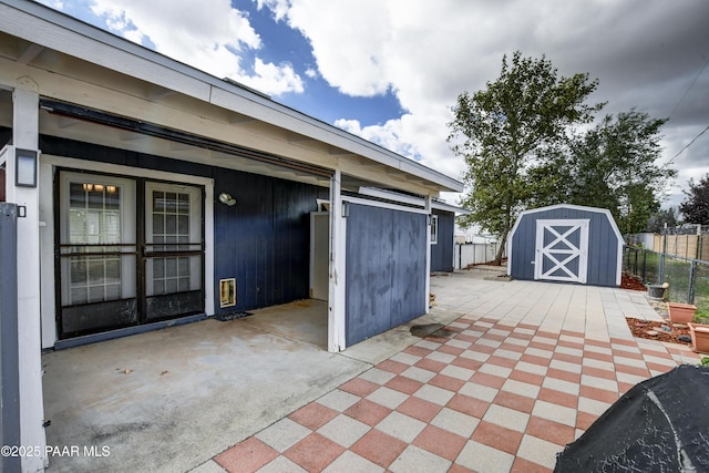 3718 N Navajo Dr, Prescott Valley, AZ 86314 - view of patio with an outdoor structure, a storage unit, and fence