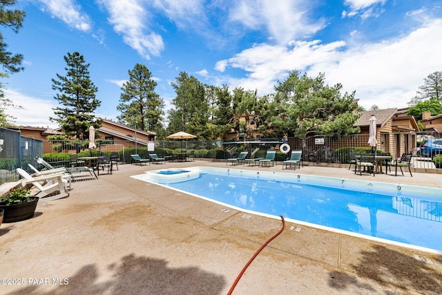 229 Creekside Cir Unit 15C, Prescott, AZ 86303 - community pool with a patio area and a hot tub