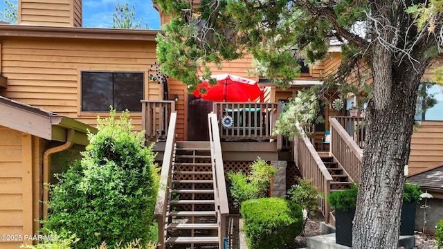 229 Creekside Cir Unit 15C, Prescott, AZ 86303 - view of playground featuring stairway and a deck