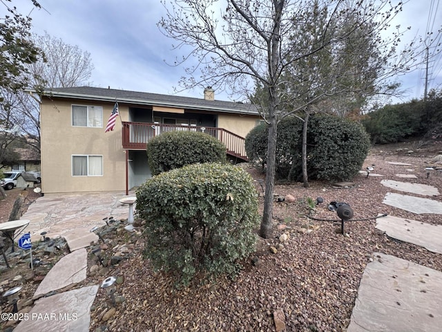 2508 N Leah Ln, Prescott, AZ 86301 - exterior space featuring a chimney, a patio area, and stucco siding