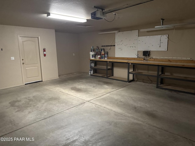 2508 N Leah Ln, Prescott, AZ 86301 - garage featuring a workshop area and a garage door opener