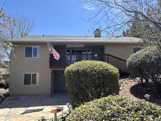 2508 N Leah Ln, Prescott, AZ 86301 - rear view of property featuring a patio, a chimney, and stucco siding
