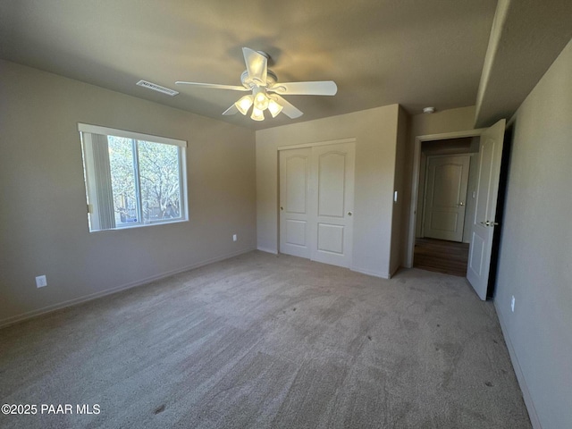 2508 N Leah Ln, Prescott, AZ 86301 - unfurnished bedroom featuring visible vents, baseboards, a closet, and light carpet