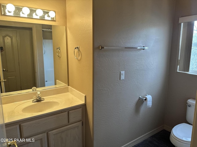 2508 N Leah Ln, Prescott, AZ 86301 - bathroom featuring vanity, tile patterned floors, baseboards, and toilet