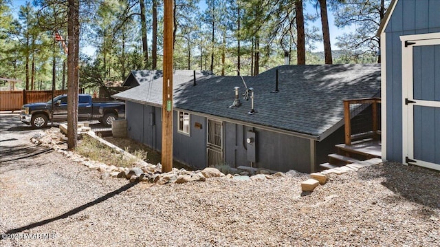 4820 S Lund Ct, Prescott, AZ 86303 - view of side of home with roof with shingles