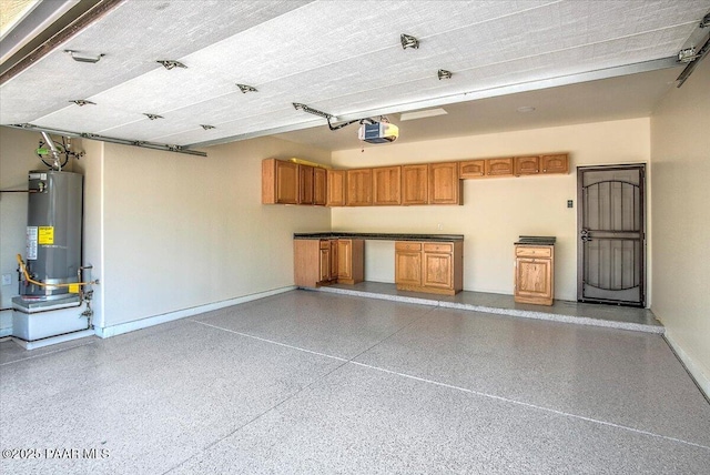 7273 Woolsey Ranch Rd, Prescott Valley, AZ 86314 - garage featuring water heater and a garage door opener