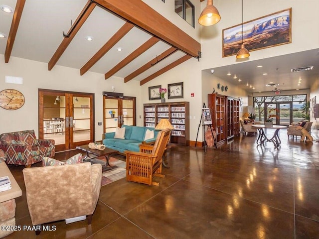 7273 Woolsey Ranch Rd, Prescott Valley, AZ 86314 - living room with french doors, concrete flooring, beam ceiling, high vaulted ceiling, and recessed lighting