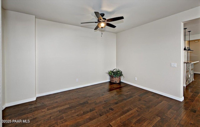 7273 Woolsey Ranch Rd, Prescott Valley, AZ 86314 - empty room featuring ceiling fan and dark wood-style flooring
