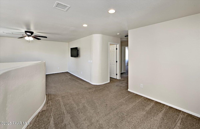 7273 Woolsey Ranch Rd, Prescott Valley, AZ 86314 - unfurnished room with carpet flooring, ceiling fan, and recessed lighting