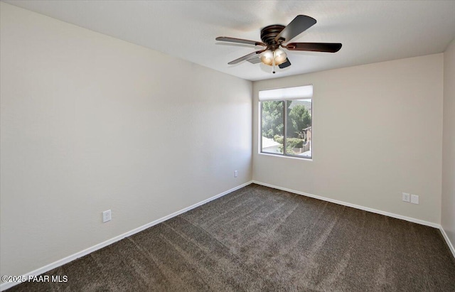 7273 Woolsey Ranch Rd, Prescott Valley, AZ 86314 - spare room with dark colored carpet and a ceiling fan
