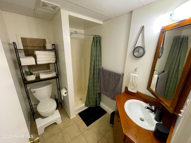 14600 E Eagle Dr, Dewey-Humboldt, AZ 86327 - bathroom with toilet, vanity, a shower with curtain, tile patterned flooring, and baseboards