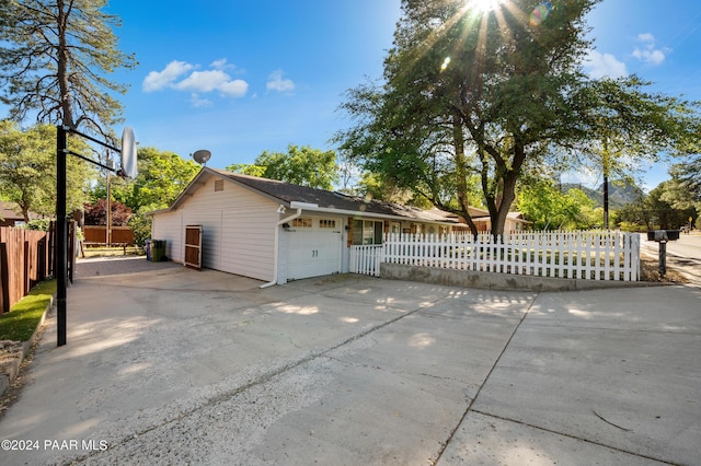 view of front of home with a garage