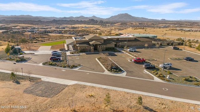 drone / aerial view featuring a mountain view